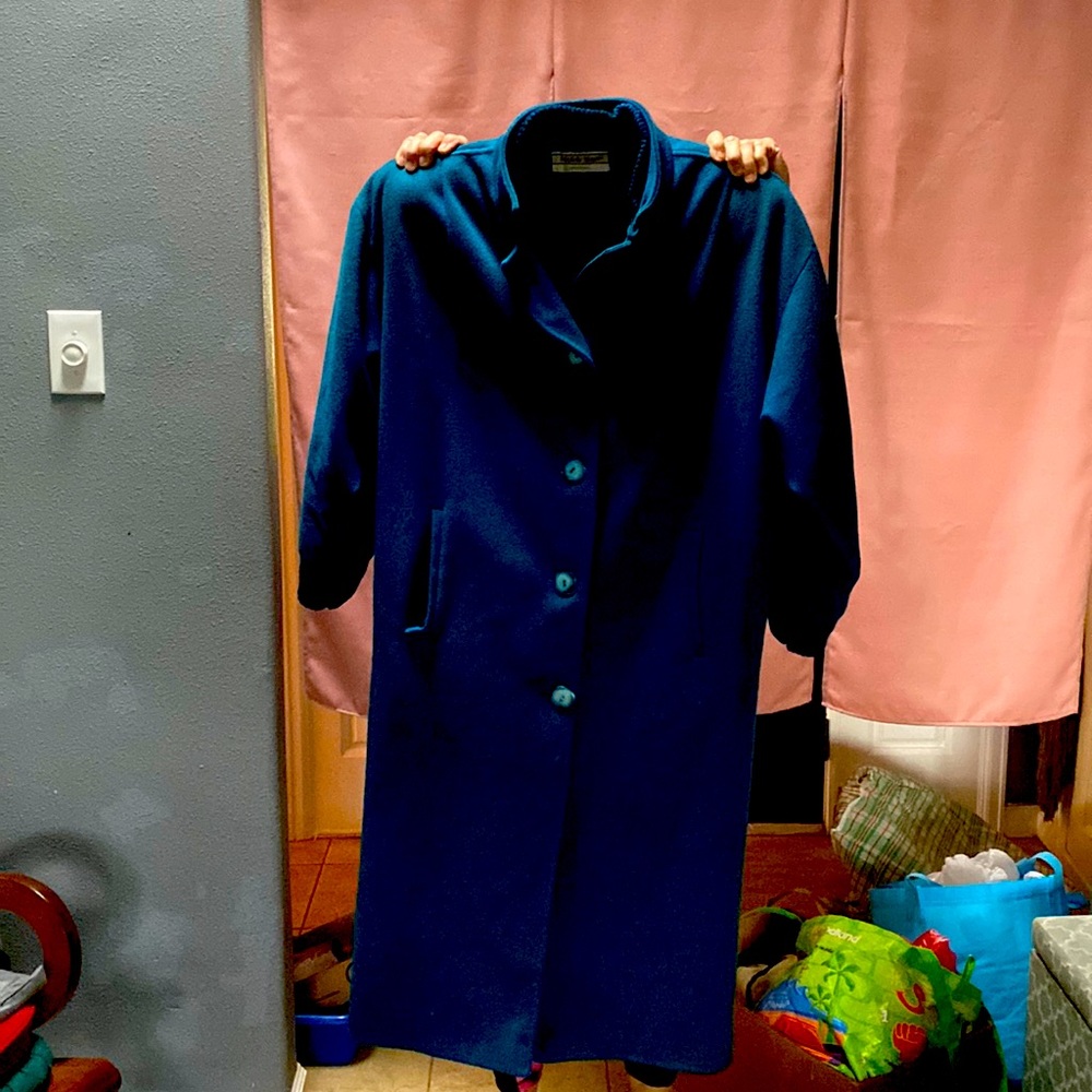 Michelle Stewart, long coat, vibrant, blue, aquamarine color very warm